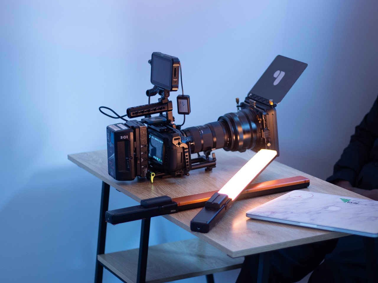 video camera on desk with light. Credit harry truong